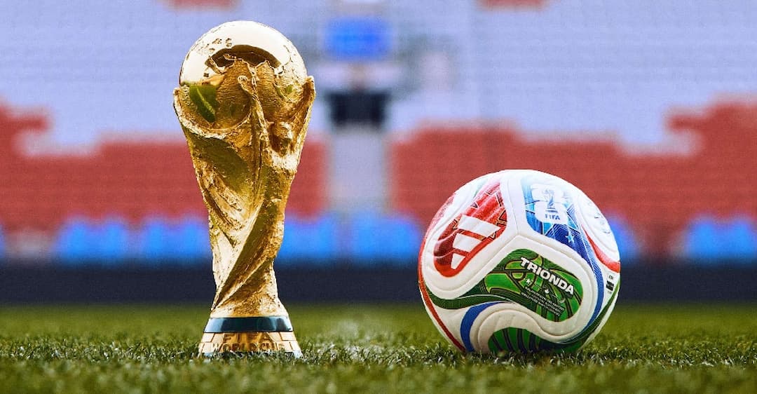 fifa 2026 world cup - official match ball with trophy on match field